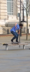 Skateboarding on a bench Liverpool Waterfront